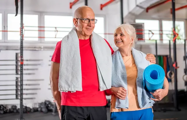 Senior couple ine the fitness club